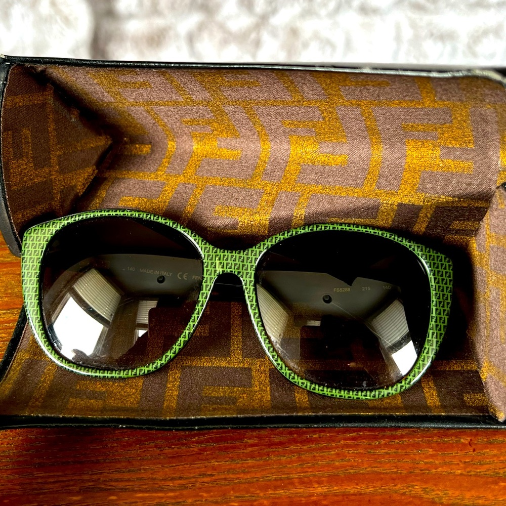 Fendi FF logo sunglasses with case.